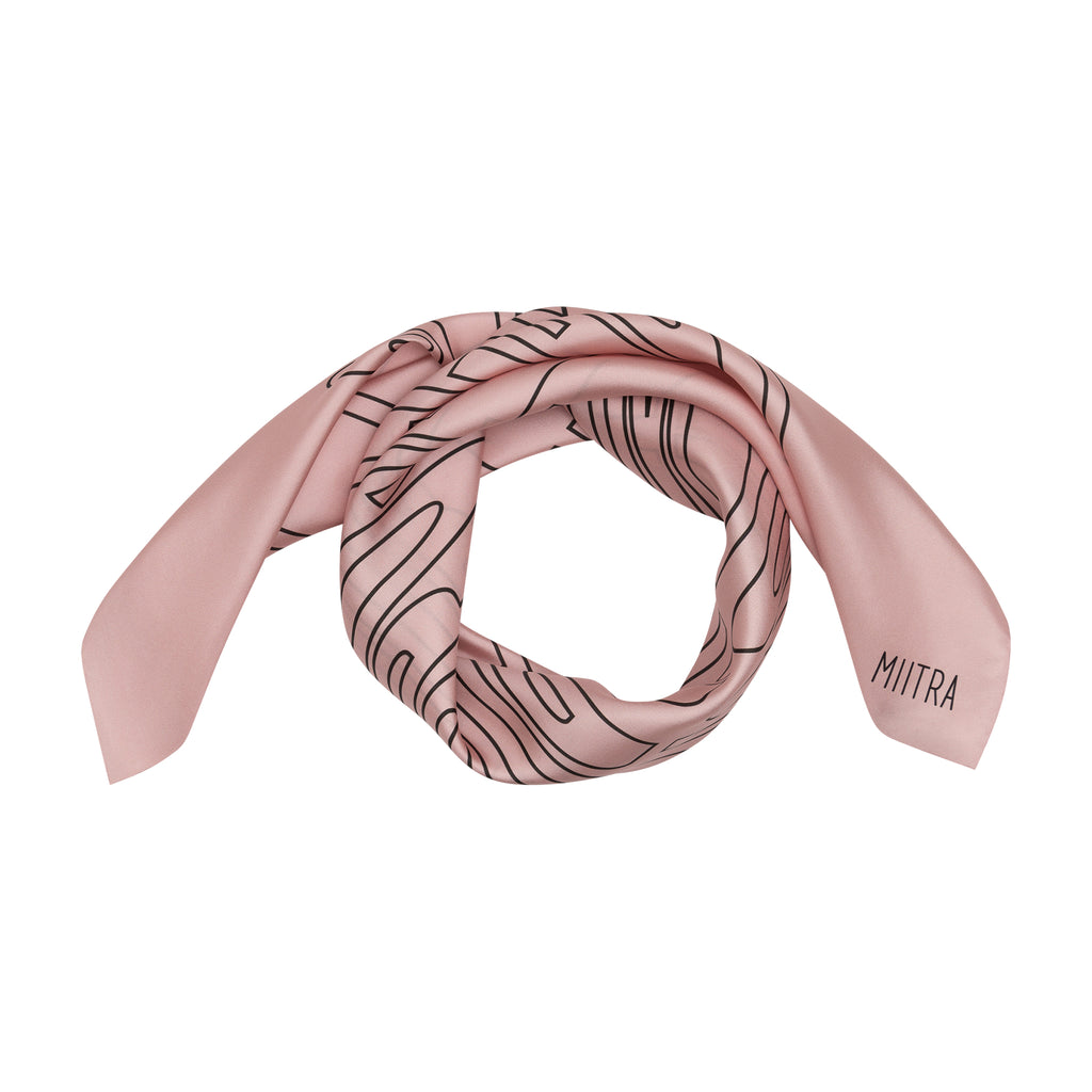 Stylized view of a pink silk scarf